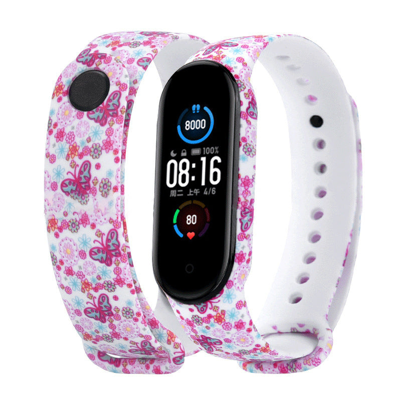 Smartwatch with floral and white band on a white background