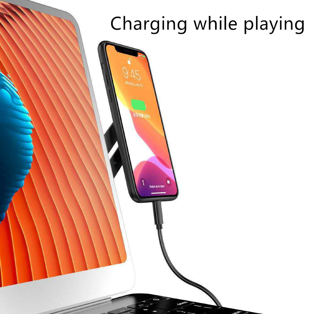 Phone being charged with a cable connected to a laptop, with text 'Charging while playing' above.