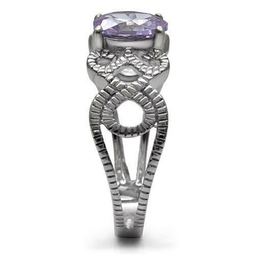 Silver ring with a purple gemstone on a white background