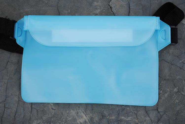 Blue plastic tool on a stone surface