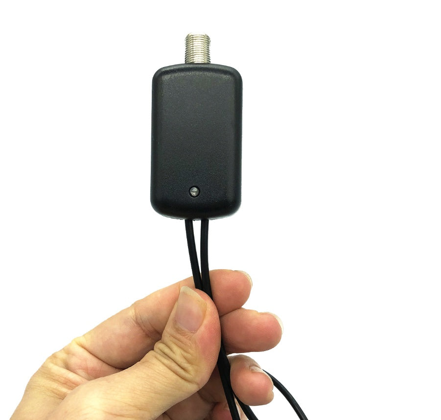 Black electronic device with antenna held by a hand on a white background