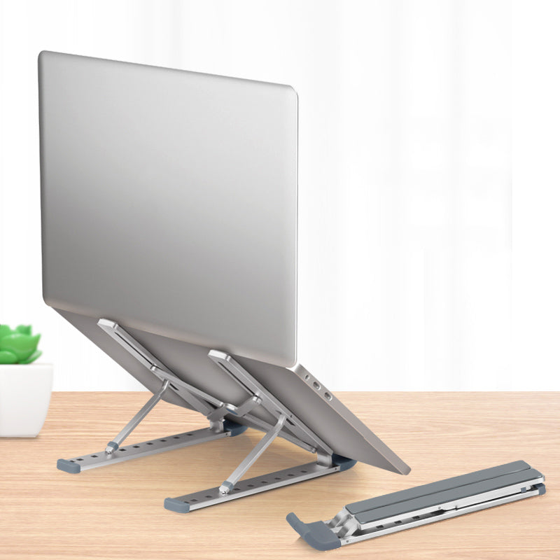 Laptop on a adjustable stand with a white background