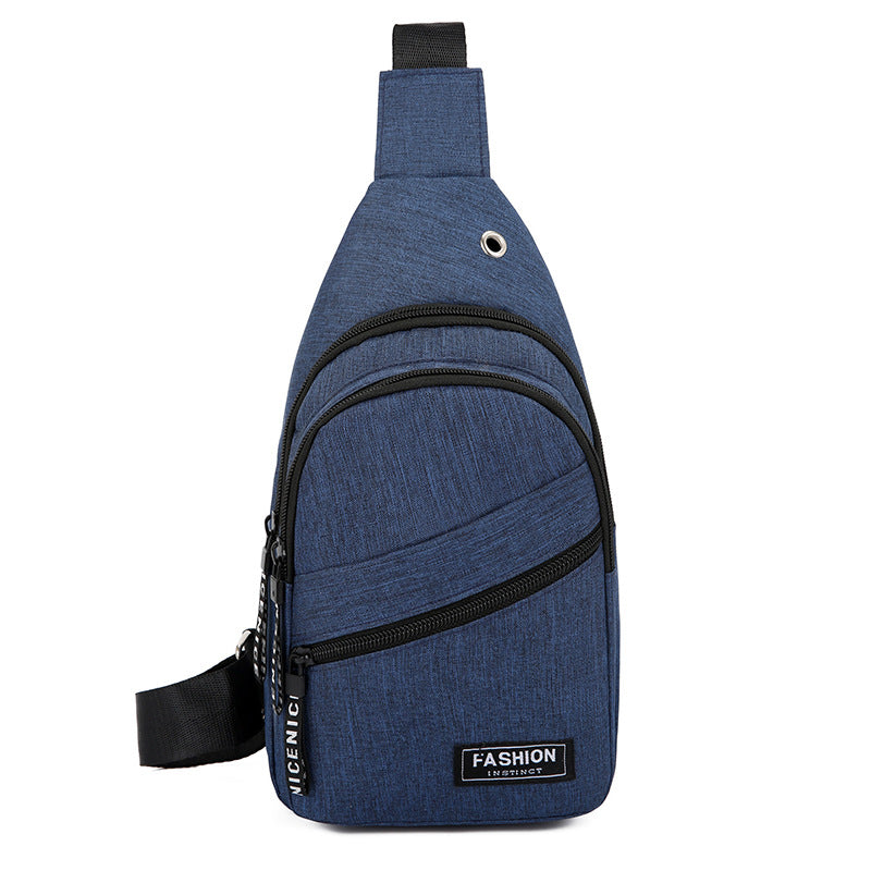Blue sling bag with black accents on a white background