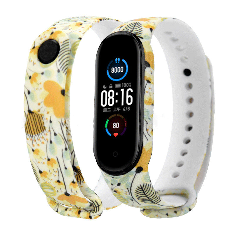 Smartwatch with a floral patterned band on a white background