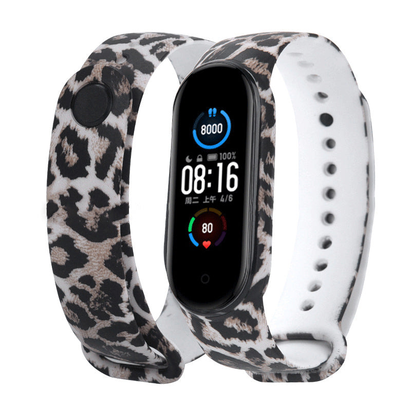 Smartwatch with a leopard print band on a white background