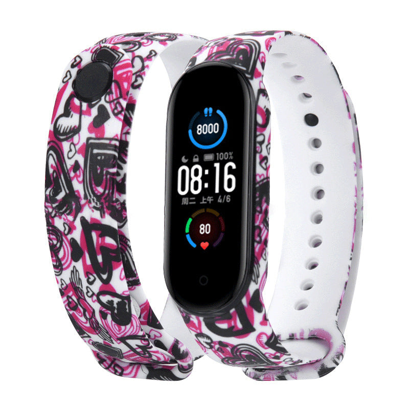 Smartwatch with a pink and black patterned band on a white background