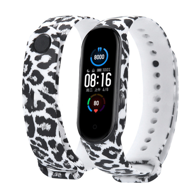 Smartwatch with a leopard print band on a white background