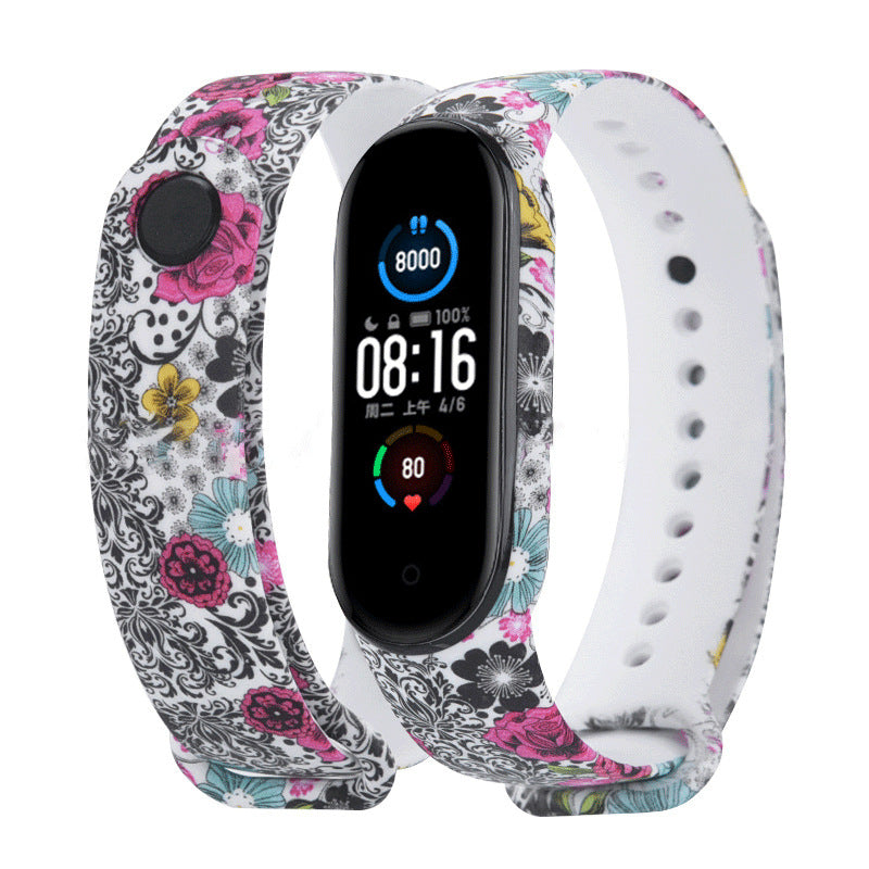 Smartwatch with a floral patterned band on a white background