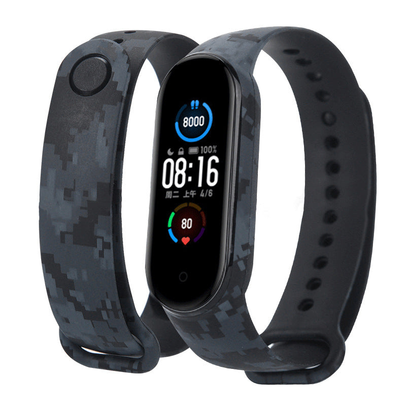 Black digital fitness tracker with camouflage band on a white background