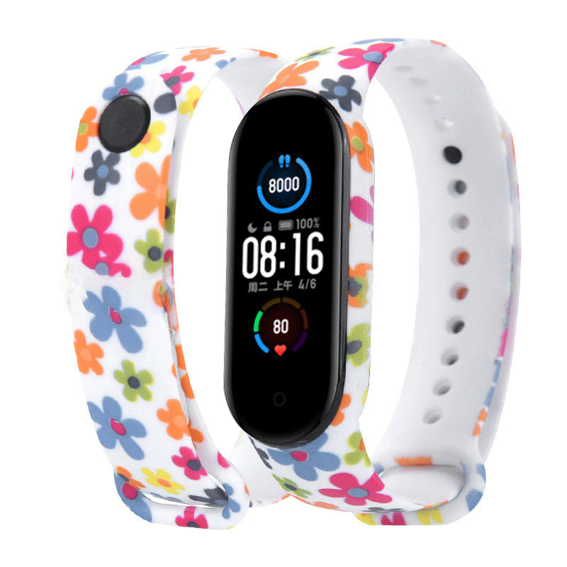 Smartwatch with a colorful floral band on a white background