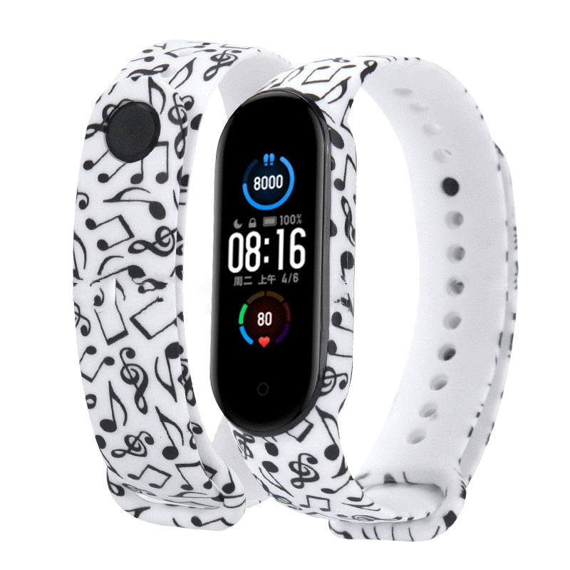 Smartwatch with a white band featuring musical notes on a white background