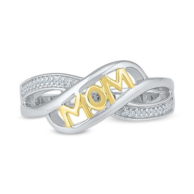 Silver and gold ring with 'MOM' engraving on a white background