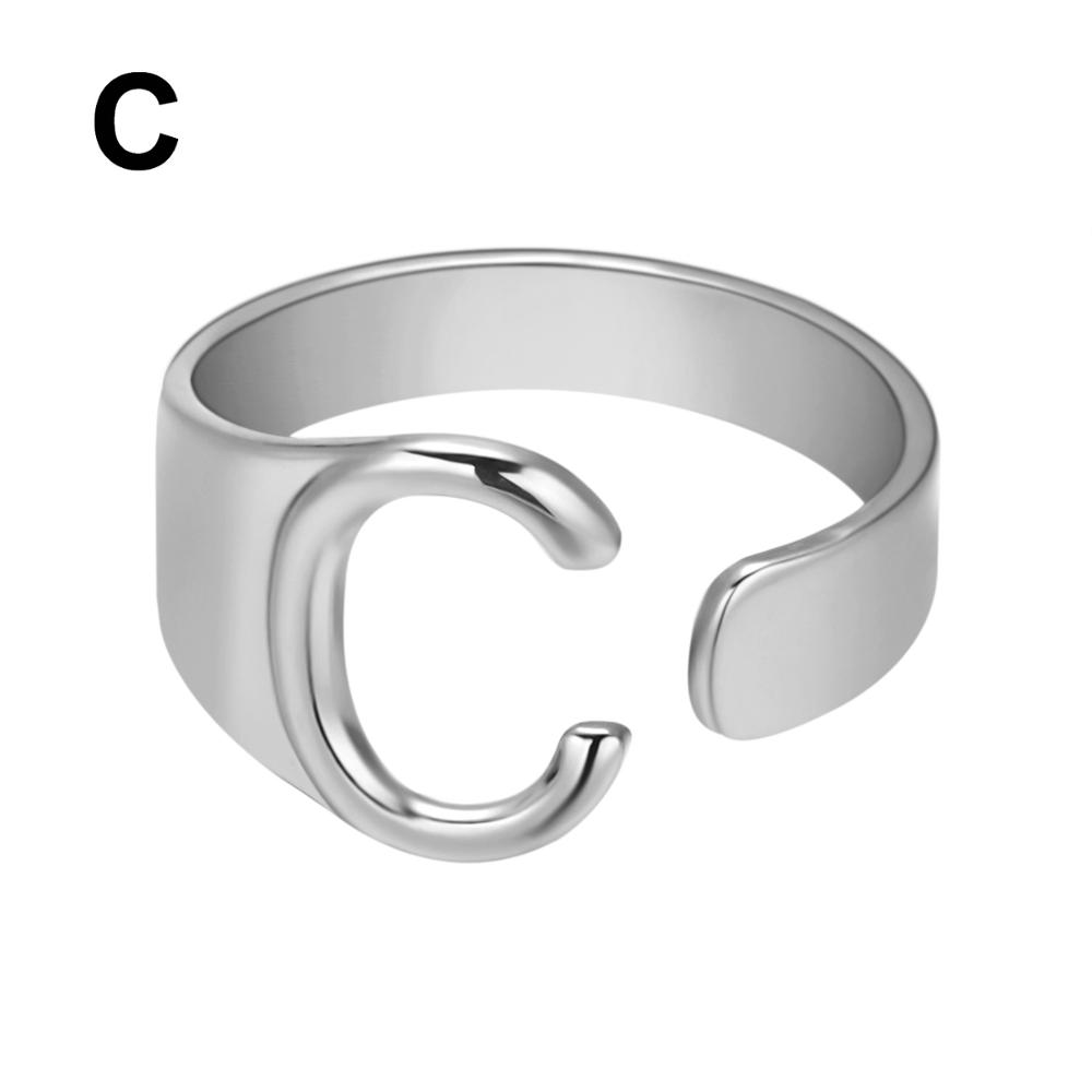 Silver open ring on a white background