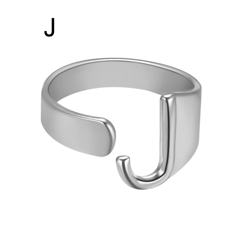 Silver open ring on a white background