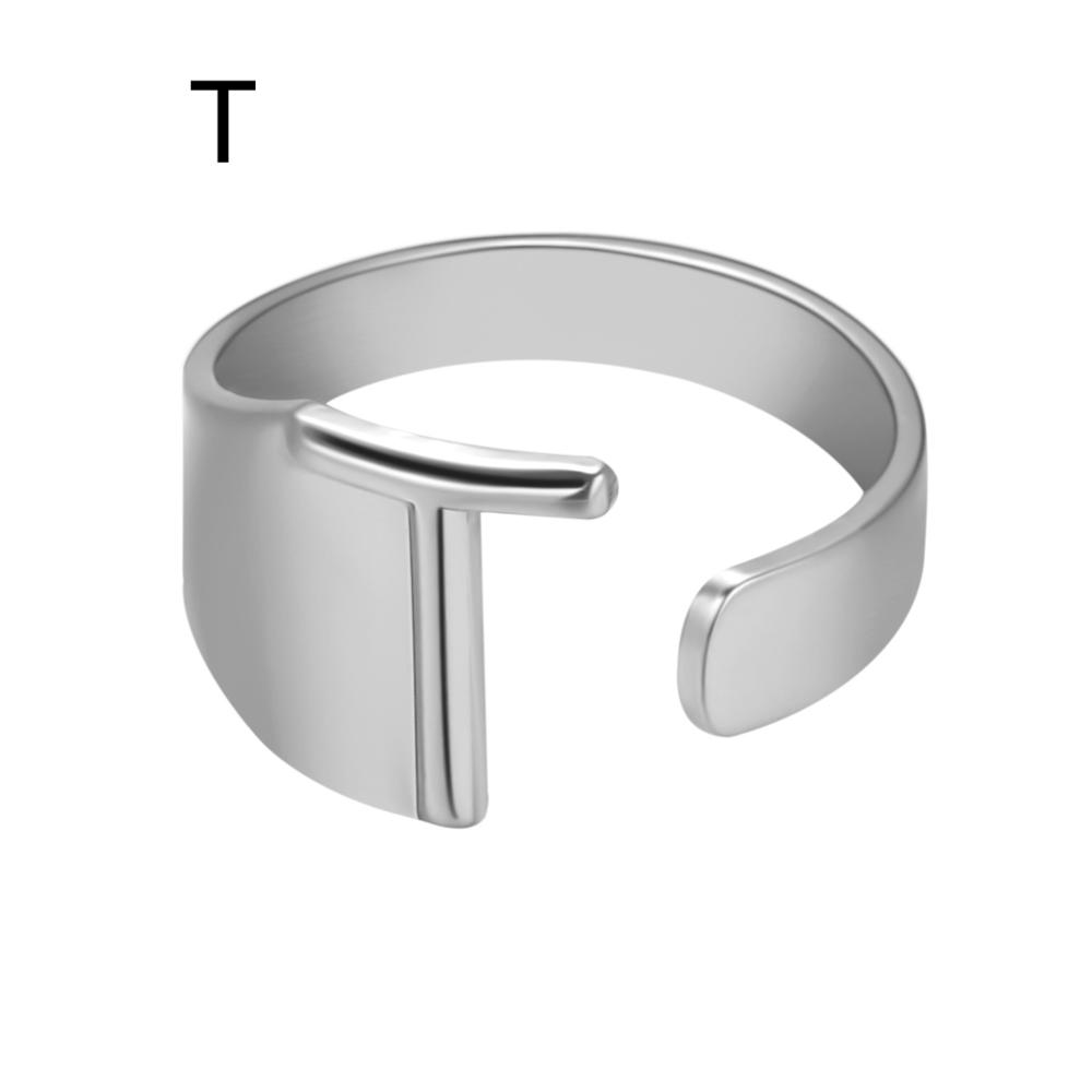 Silver open-topped ring on a white background