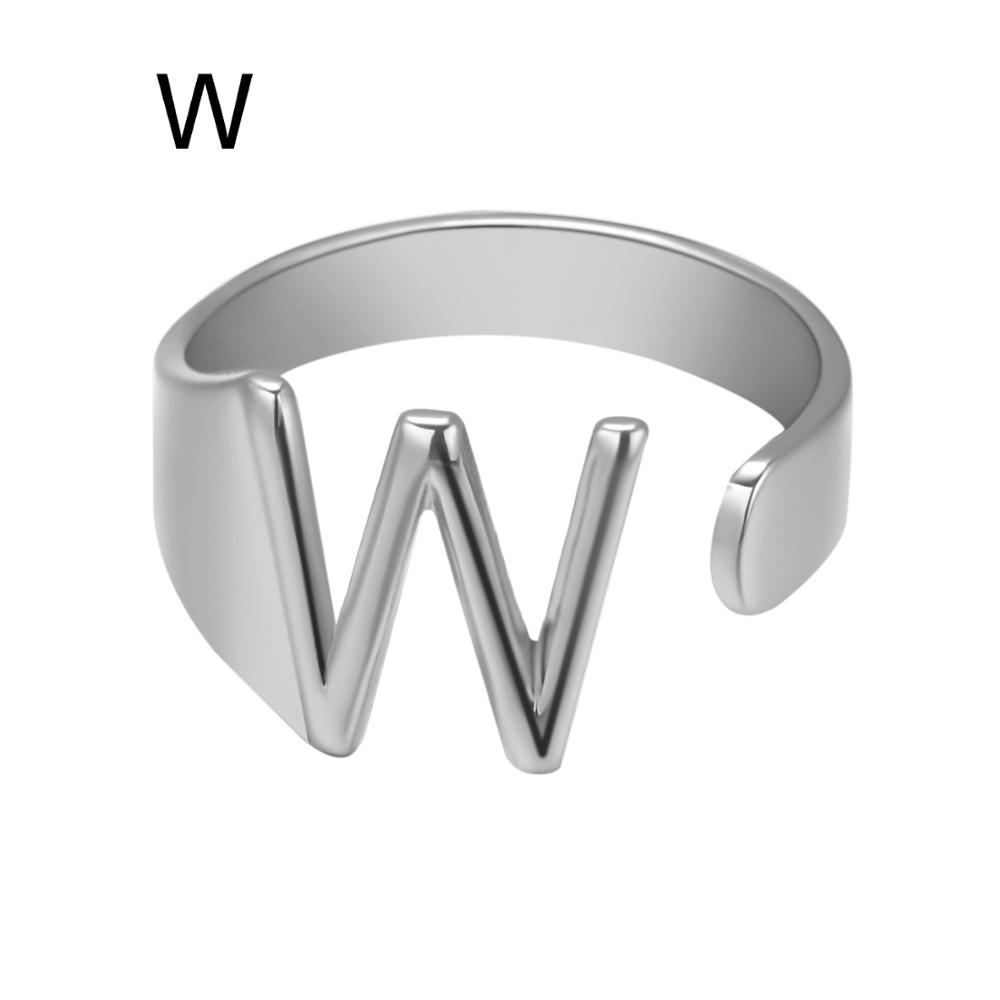 Silver ring with letter 'W' on a white background