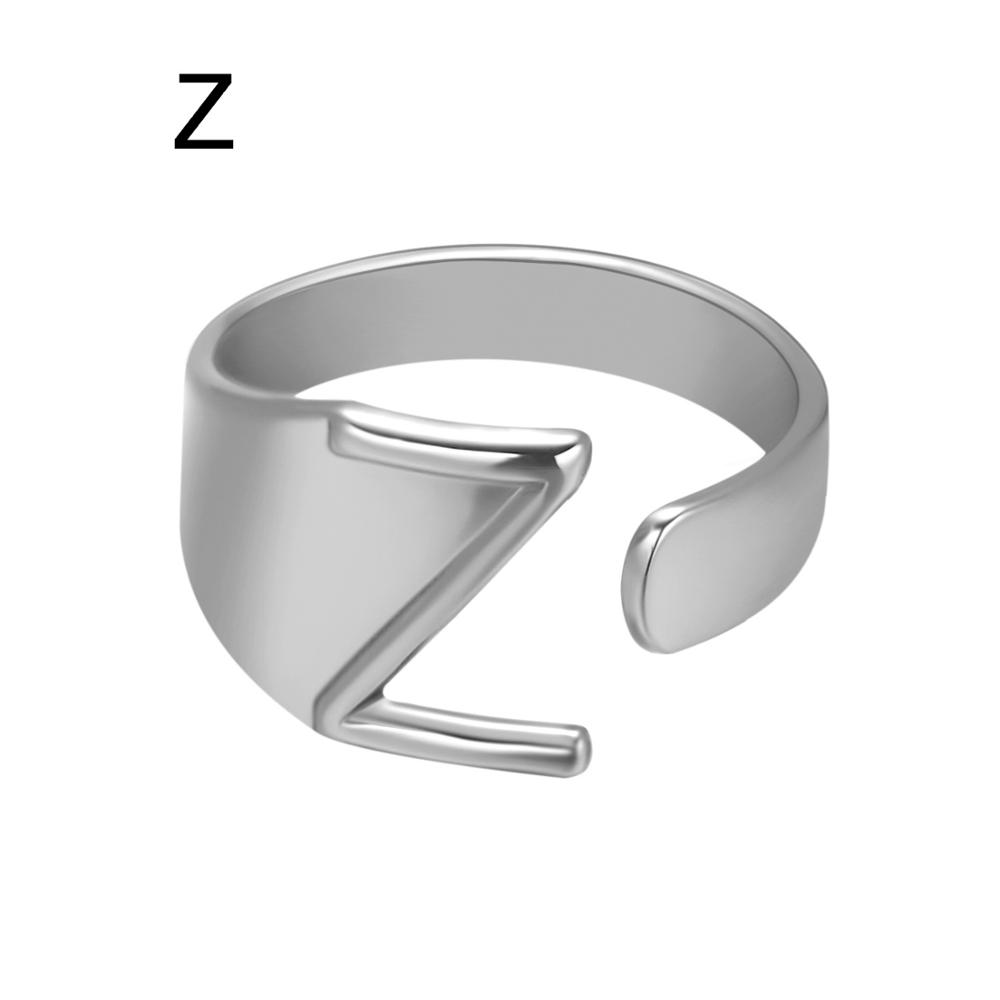 Silver open ring on a white background