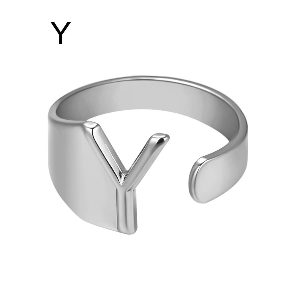 Silver ring with a 'Y' design on a white background