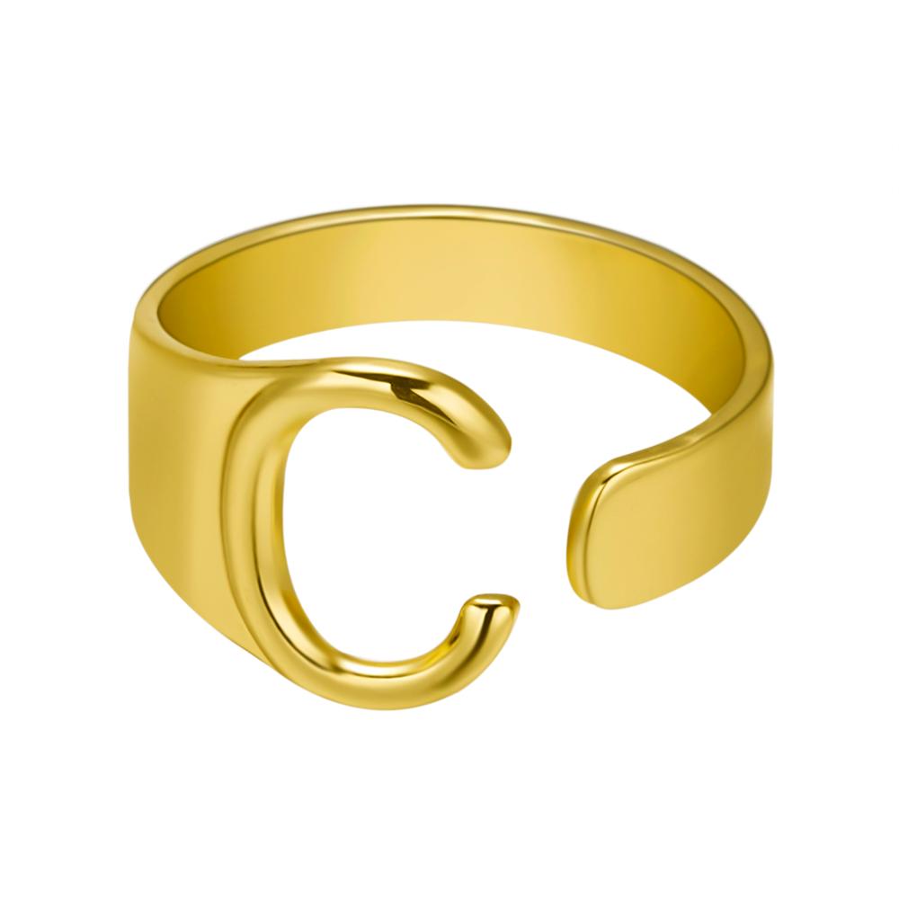 Gold open ring on a white background