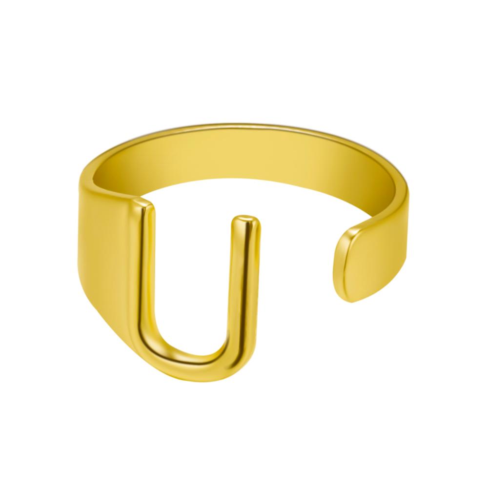 Gold U-shaped ring on a white background