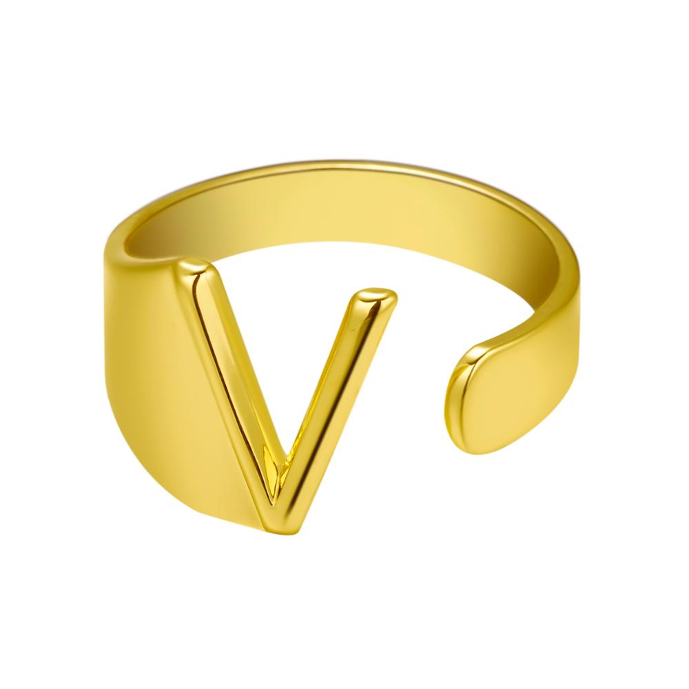Gold ring with a V-shaped design on a white background