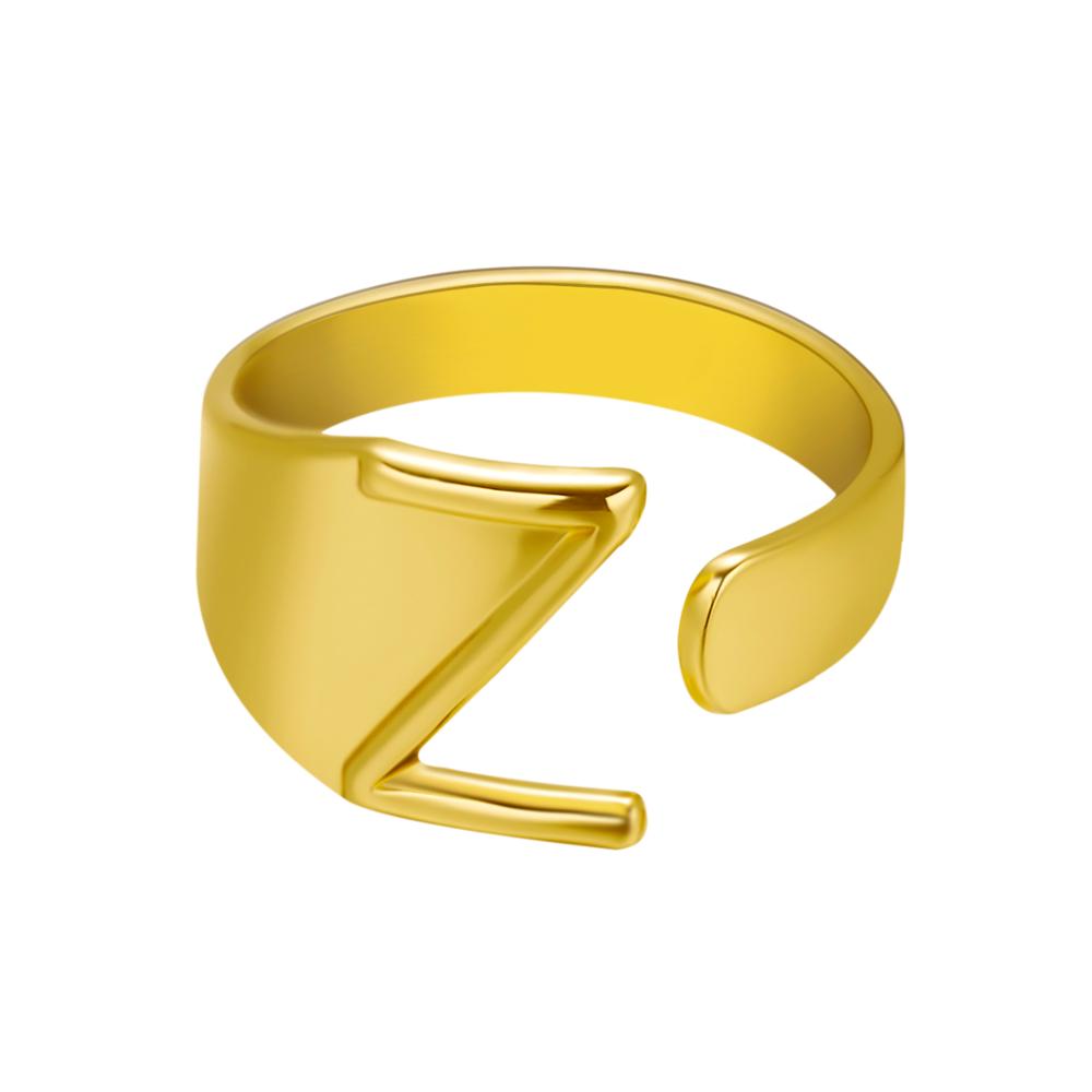 Gold open ring on a white background