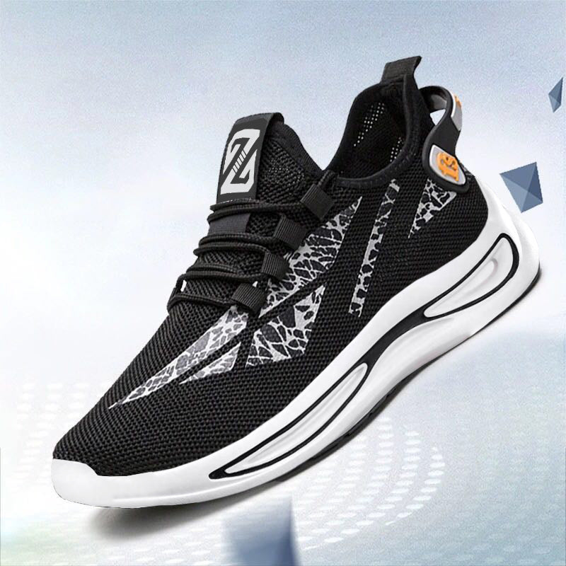 Black and white sneaker with brand logo on a light blue background