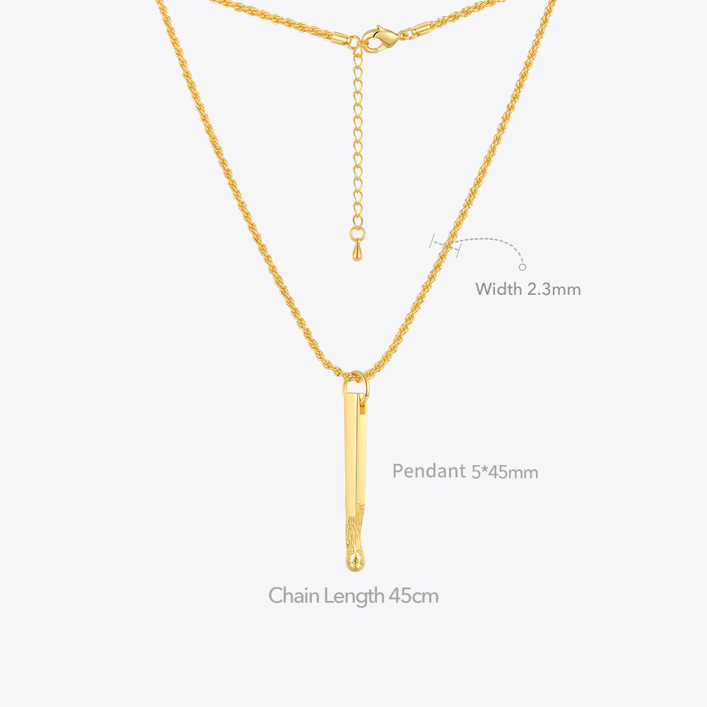 Gold necklace with a pendant on a white background