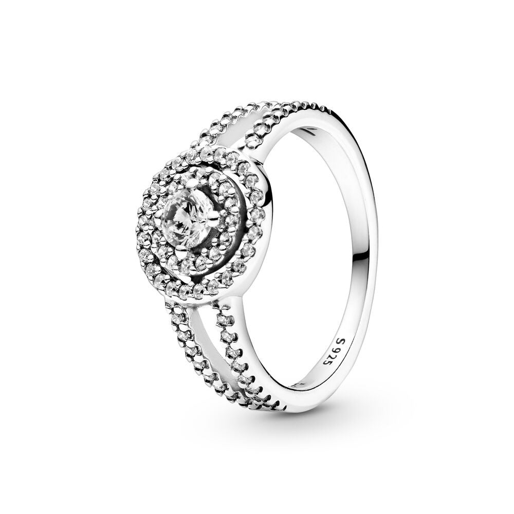 Silver ring with gemstone on a white background