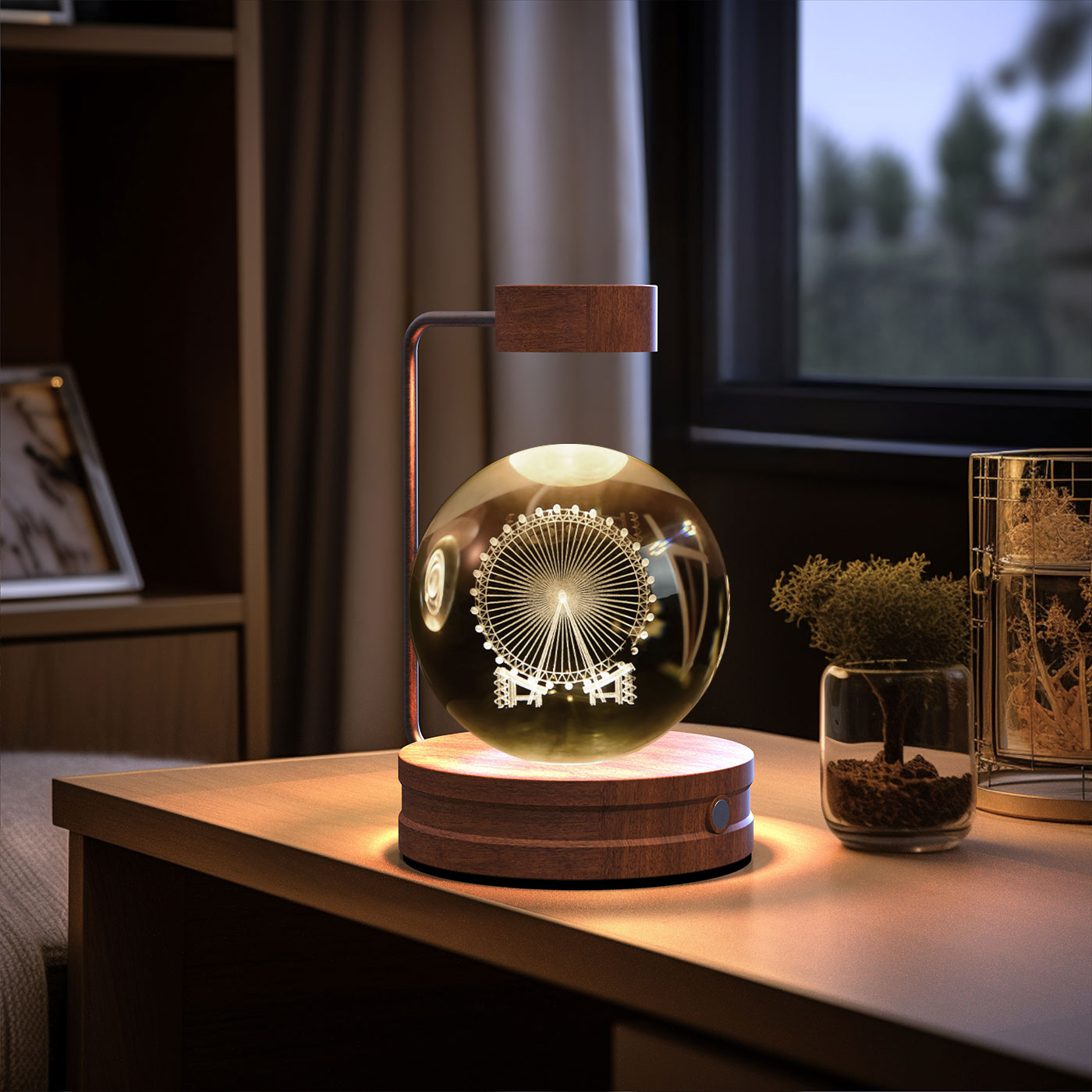 Decorative lamp with Ferris wheel design inside a glass sphere on a wooden base, placed on a table.