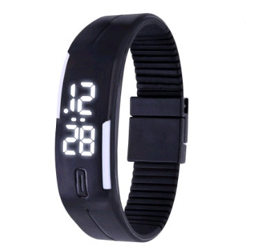 Black digital wristwatch with LED display on a white background