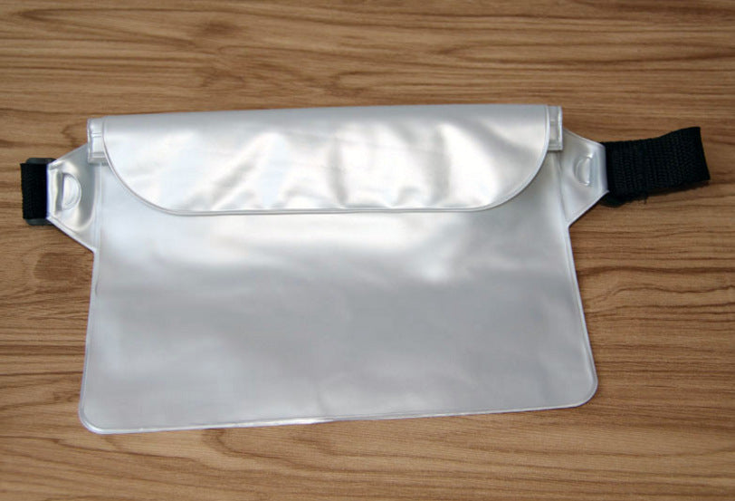Clear waist bag with black strap on a wooden surface