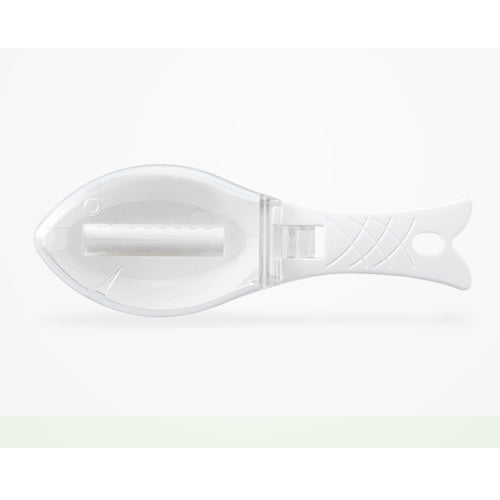 White fish-shaped spoon rest on a white background