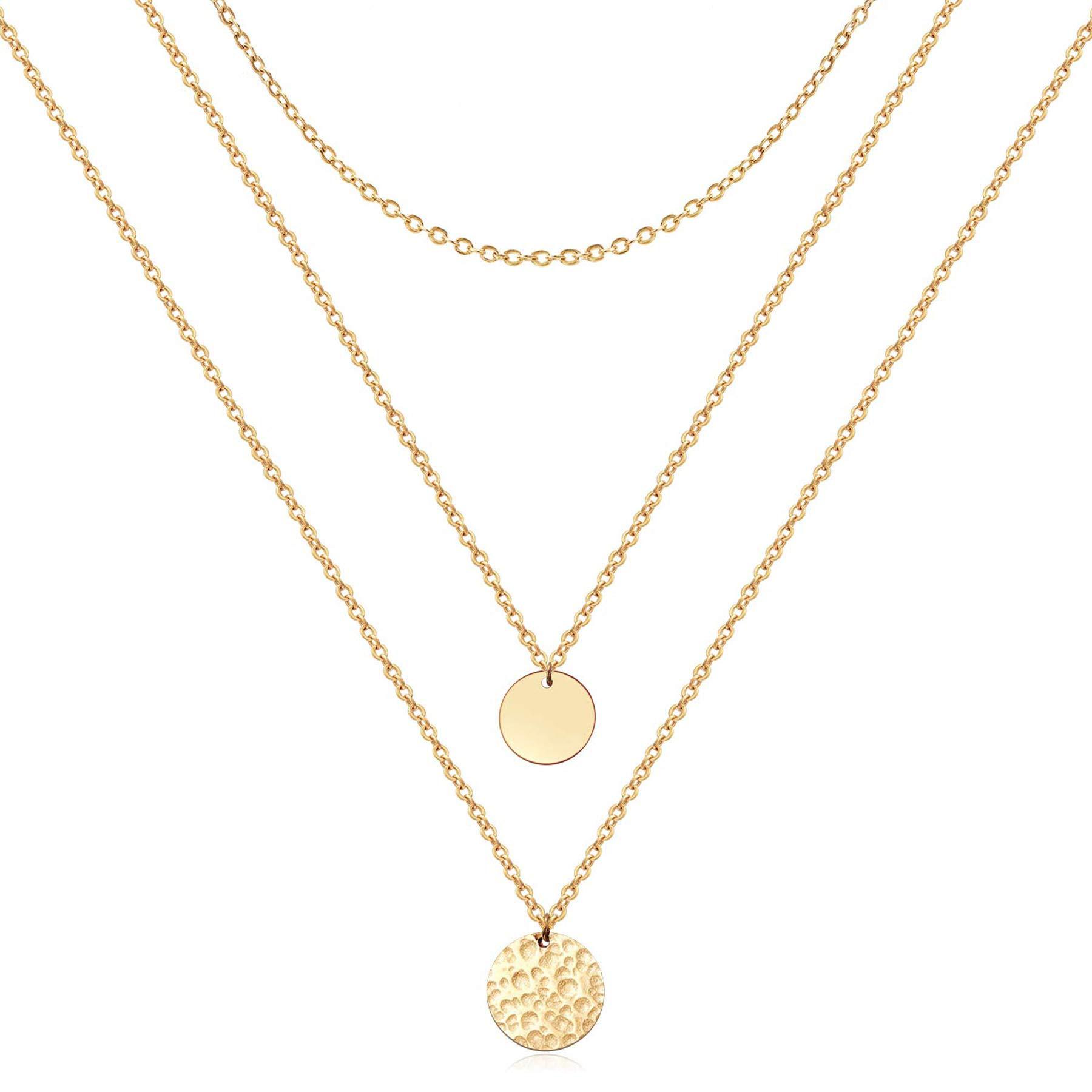 Two gold necklaces with round pendants on a white background