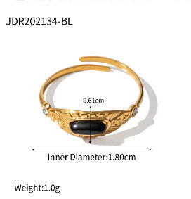 Gold bracelet with black stone measurement details on a white background