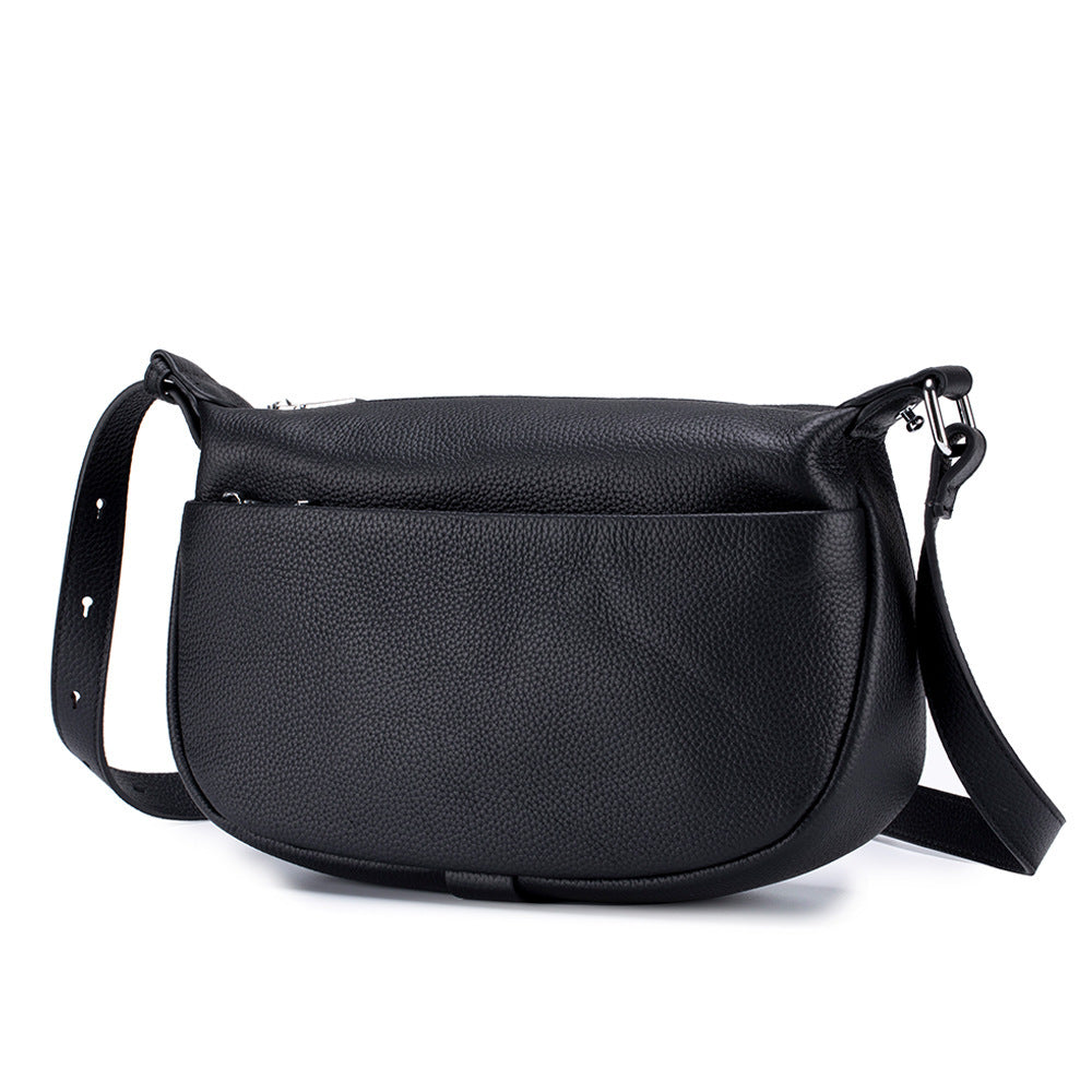 Black leather shoulder bag on a white background
