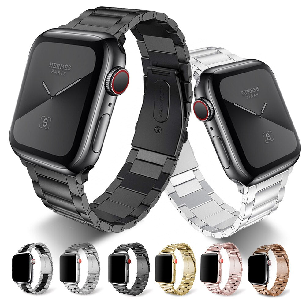 Two Hermès smartwatches with interchangeable metal bands on a white background.