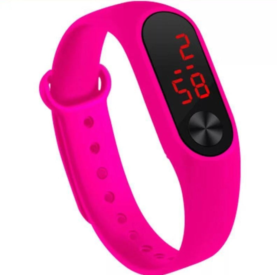 Pink digital fitness tracker on a white background