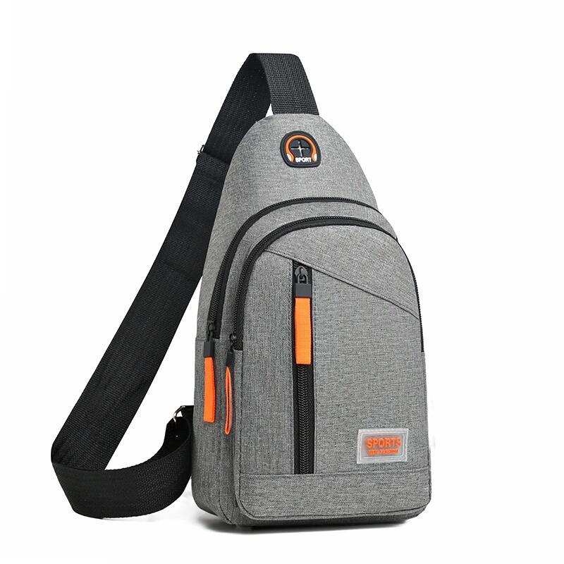 Gray sling bag with orange accents on a white background