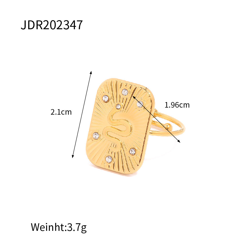 Gold ring with measurements and weight details on a white background