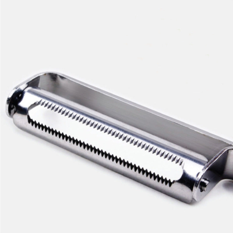 Metallic cylindrical tool with a ribbed surface on a white background
