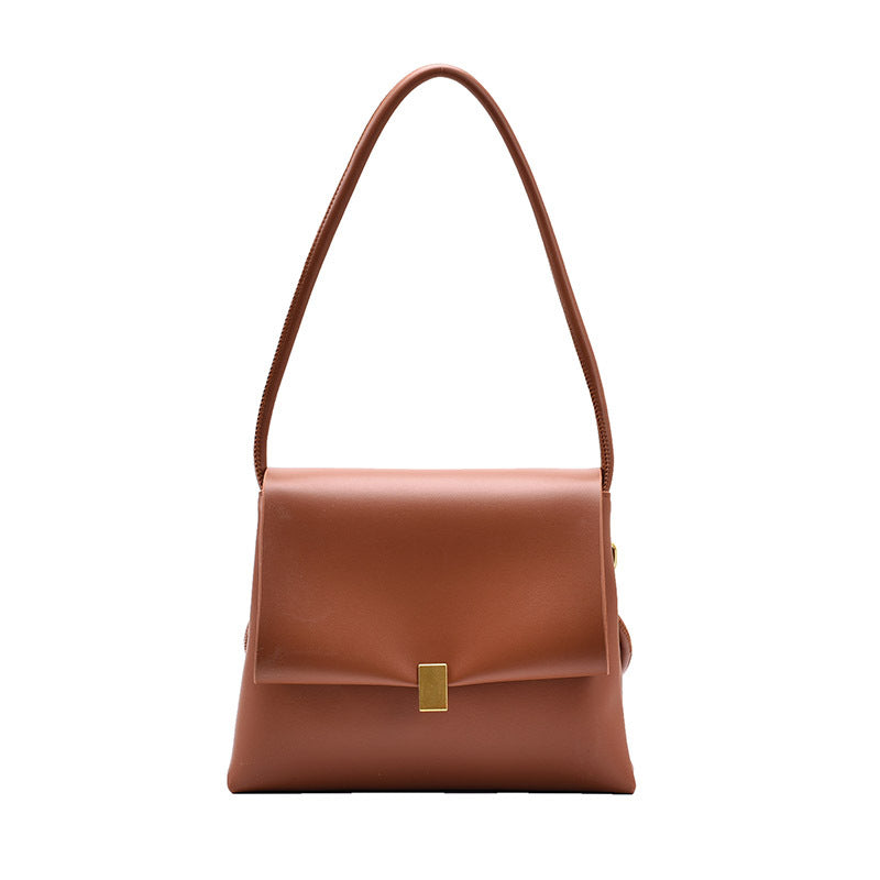 Brown leather handbag with a gold clasp on a white background