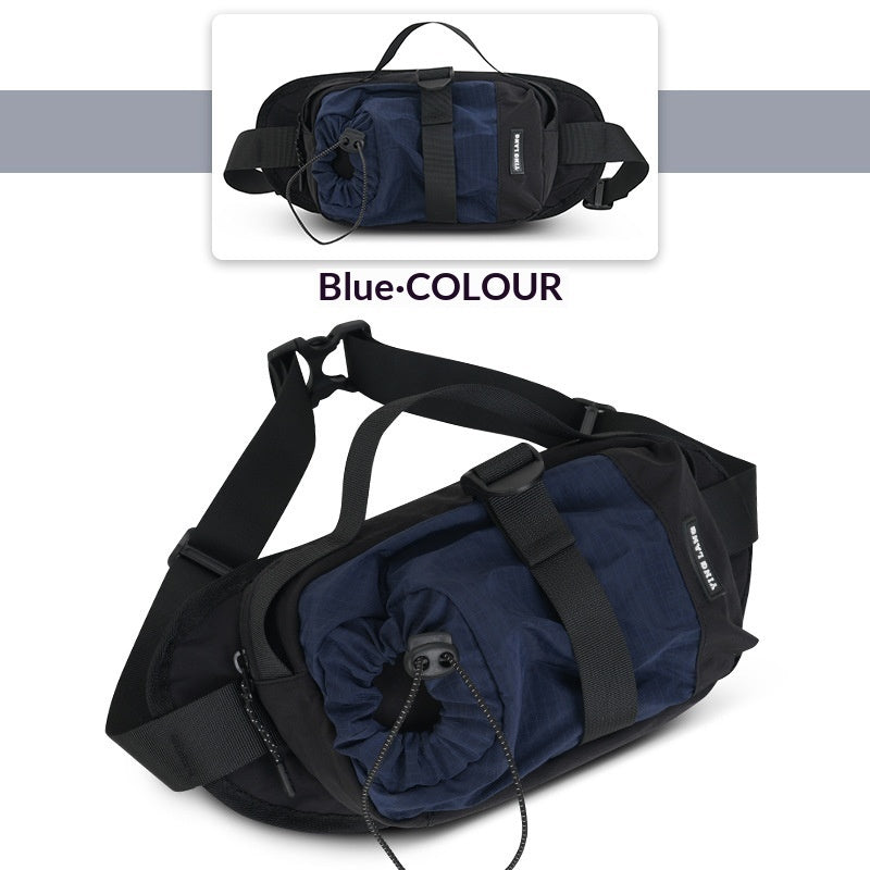 Black waist bag with blue drawstring pouch on a white background