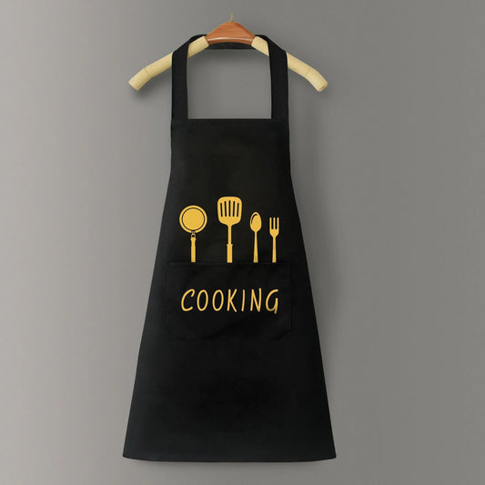 Black apron with yellow icons and 'COOKING' text on a gray background