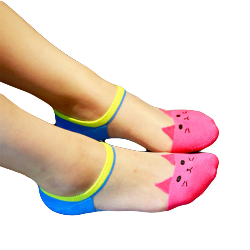 Colorful socks with cat faces on a white background