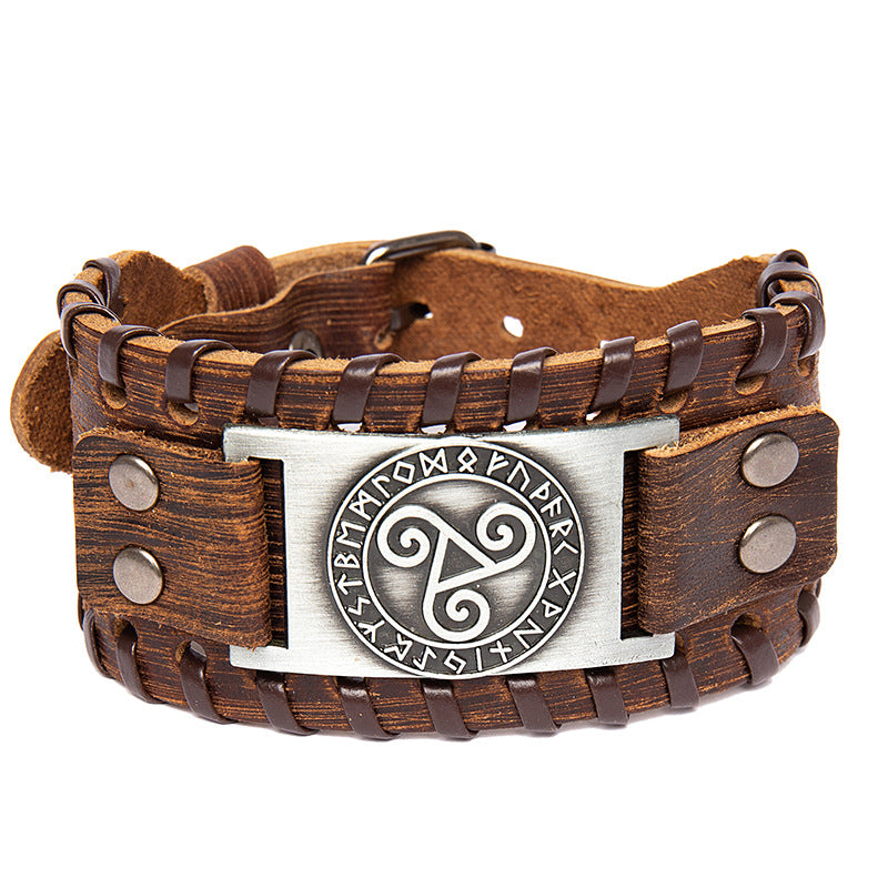 Brown leather bracelet with silver metal clasp featuring a symbol on a white background