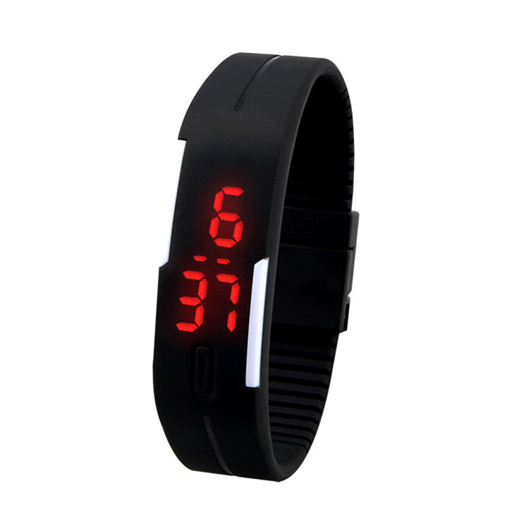 Black digital watch with red LED display on a white background