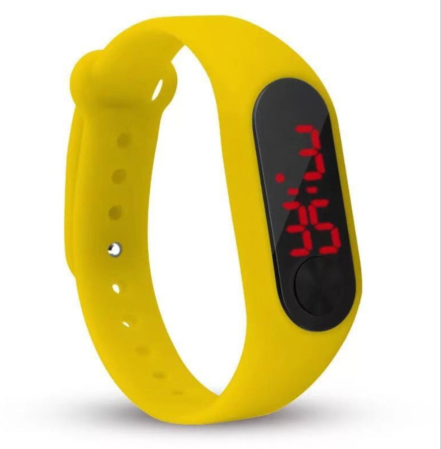 Yellow digital watch with a black screen on a white background