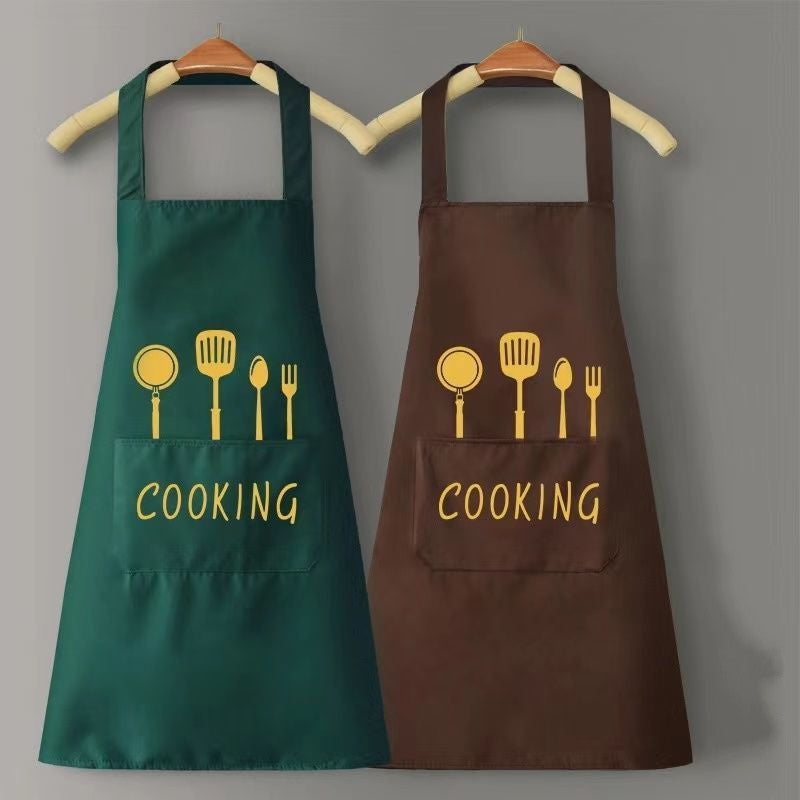 Two aprons, one green and one brown, with yellow kitchen utensil icons and 'COOKING' text on a gray background.