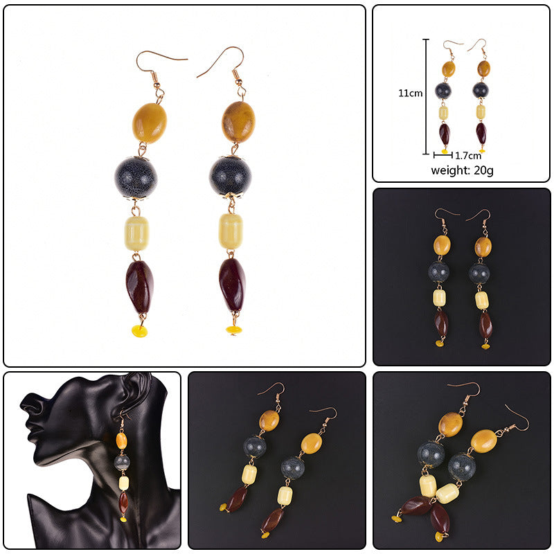 Multicolored beaded earrings with measurements and weight displayed on a white background.